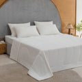 Woman enjoying Lullabee Cooling Comforter for night sweats and hot flashes
