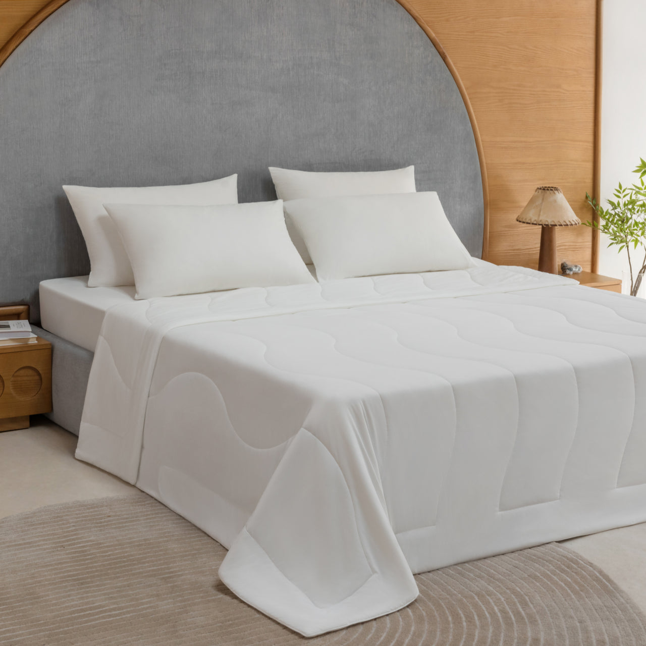 Woman enjoying Lullabee Cooling Comforter for night sweats and hot flashes