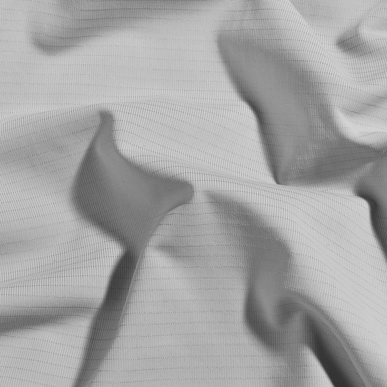 Close-up of gray CoolingCode™ fitted sheet's elastic edges, preventing slipping and enhancing heat dissipation