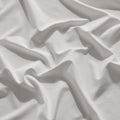 CoolingCode™ fitted sheet texture showing soft, breathable fabric for ultimate comfort and pet-friendly use.