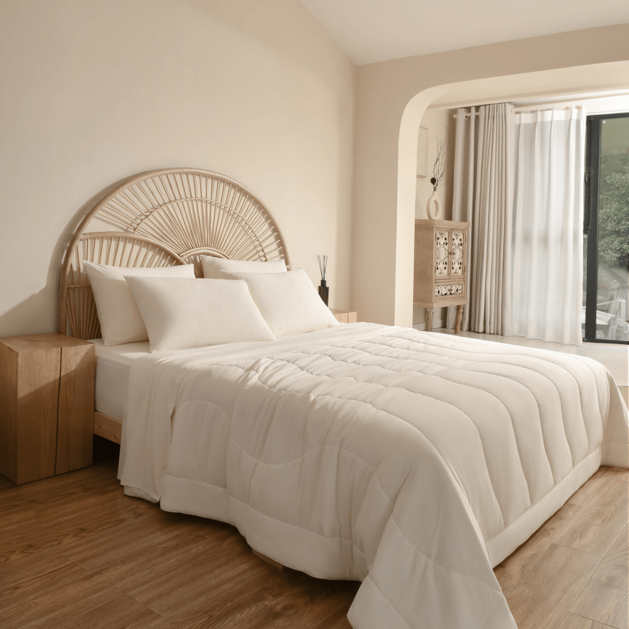 Elegant bedroom featuring a CoolingCode™ sheet set with fitted sheet and two pillowcases in a serene setting.